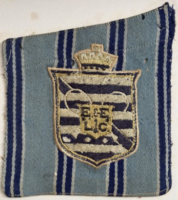 Original pocket and badge adopted in 1929 and replaced in 1987.