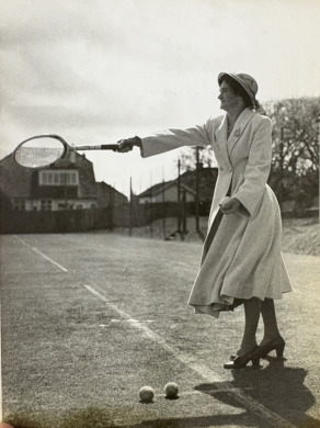Mrs Jean Hayr serving to open the courts on Opening Day, 1952